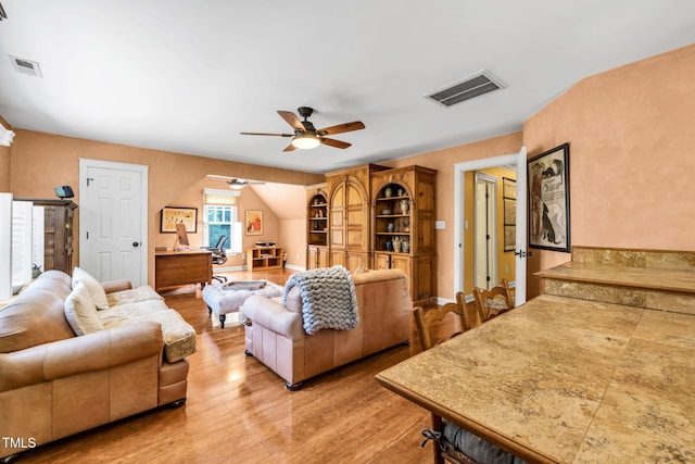 9009 Hometown Dr, Raleigh, NC 27615 - living room featuring ceiling fan, light wood-style floors, and an office area