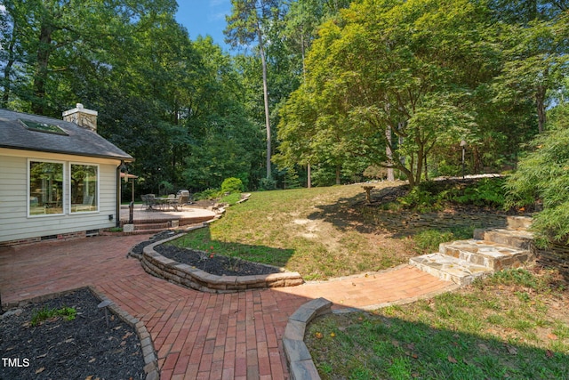 9009 Hometown Dr, Raleigh, NC 27615 - view of green lawn with a patio