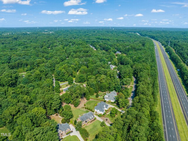 9009 Hometown Dr, Raleigh, NC 27615 - aerial view of property's location featuring a forest and a major roadway