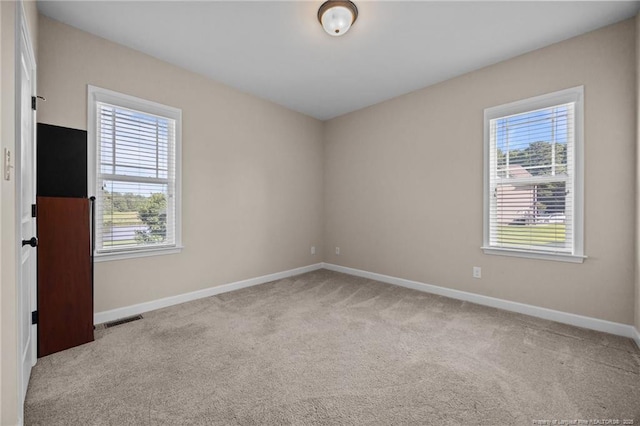 34 Westchester Ln, Angier, NC 27501 - carpeted empty room with baseboards