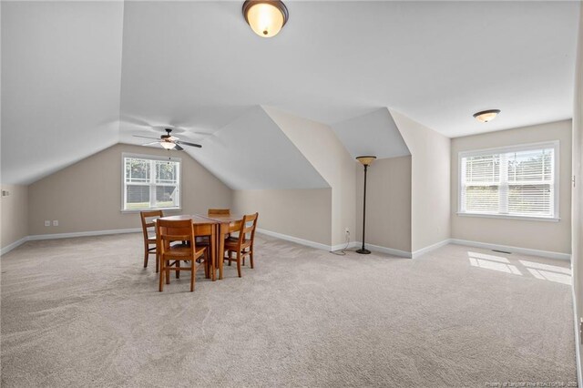 34 Westchester Ln, Angier, NC 27501 - dining room featuring carpet floors, lofted ceiling, and ceiling fan