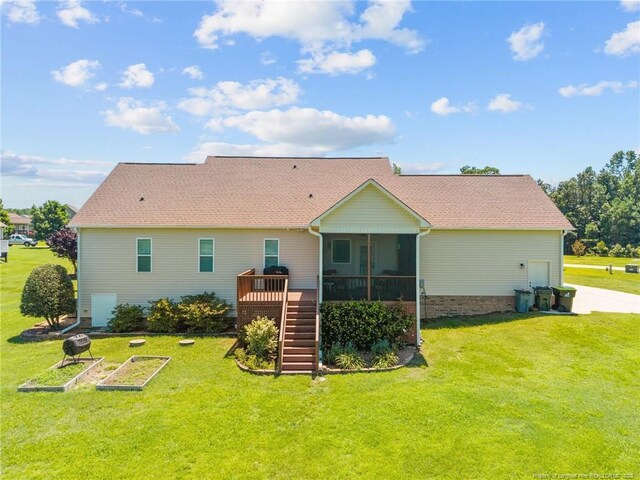 34 Westchester Ln, Angier, NC 27501 - rear view of property featuring stairs, a sunroom, and a lawn