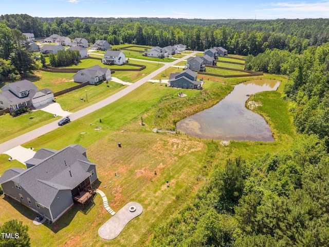 40 Cinnamon Teal Way, Youngsville, NC 27596 - aerial view of residential area with a nearby body of water and a forest