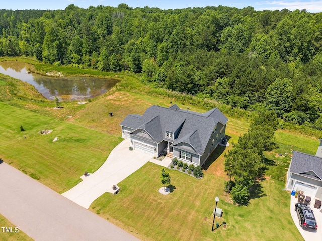 40 Cinnamon Teal Way, Youngsville, NC 27596 - aerial view of property and surrounding area with a heavily wooded area and a nearby body of water