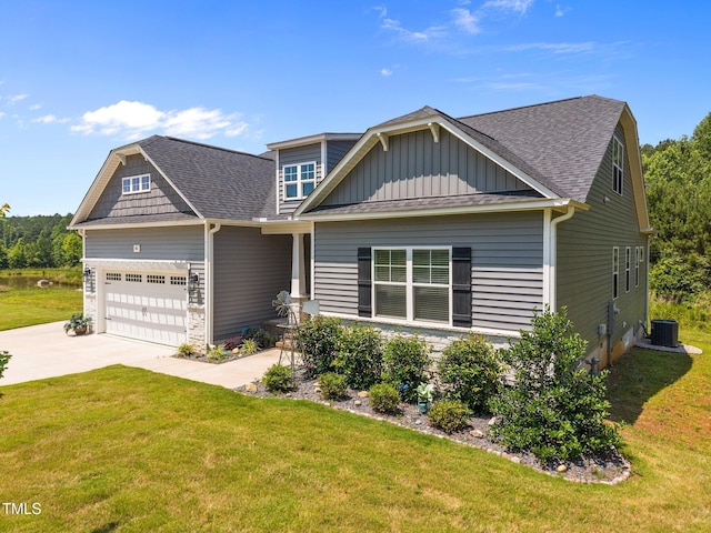 40 Cinnamon Teal Way, Youngsville, NC 27596 - craftsman house featuring a garage, a front yard, board and batten siding, and concrete driveway