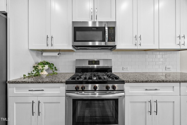 40 Cinnamon Teal Way, Youngsville, NC 27596 - kitchen featuring appliances with stainless steel finishes, white cabinets, and tasteful backsplash