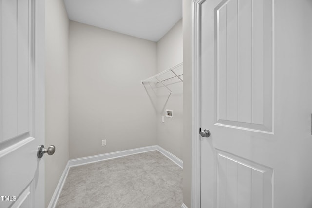 40 Cinnamon Teal Way, Youngsville, NC 27596 - laundry room featuring baseboards