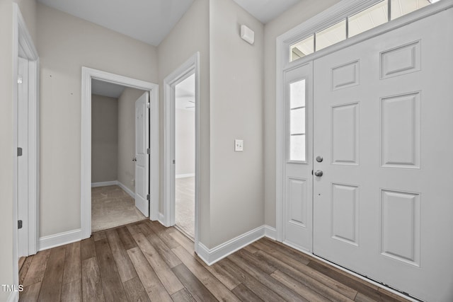 40 Cinnamon Teal Way, Youngsville, NC 27596 - foyer entrance featuring dark wood-style floors and baseboards