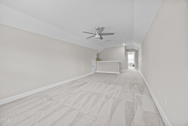 40 Cinnamon Teal Way, Youngsville, NC 27596 - additional living space with lofted ceiling, light colored carpet, and a ceiling fan