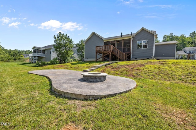 40 Cinnamon Teal Way, Youngsville, NC 27596 - back of house featuring an outdoor fire pit, stairs, a patio, a yard, and a deck