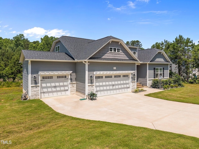 40 Cinnamon Teal Way, Youngsville, NC 27596 - craftsman-style house with stone siding, a garage, concrete driveway, and a front lawn