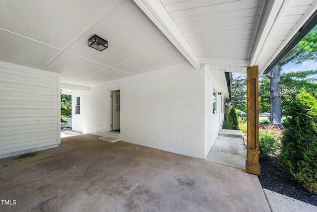 313 13th St, Butner, NC 27509 - view of patio with an attached carport