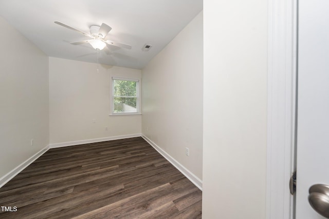 313 13th St, Butner, NC 27509 - empty room featuring dark wood finished floors, a ceiling fan, and lofted ceiling