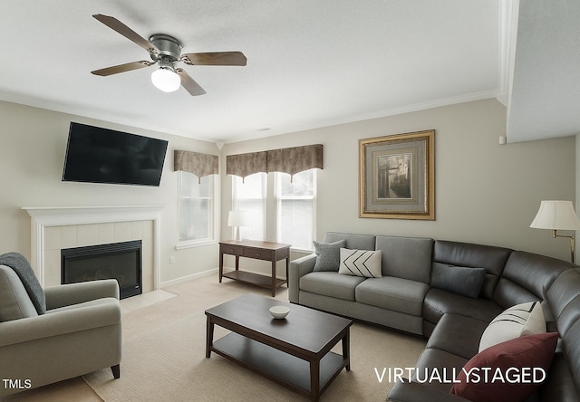 3610 Long Ridge Rd, Durham, NC 27703 - living room featuring a ceiling fan, light carpet, crown molding, and a tile fireplace