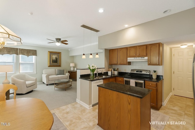 3610 Long Ridge Rd, Durham, NC 27703 - kitchen featuring stainless steel range with electric cooktop, under cabinet range hood, dishwasher, open floor plan, and brown cabinetry