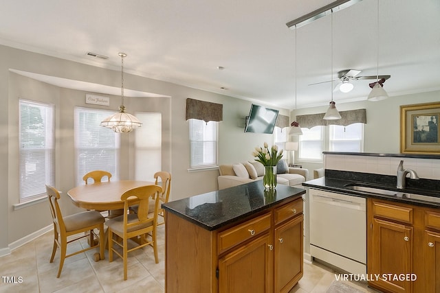 3610 Long Ridge Rd, Durham, NC 27703 - kitchen featuring dishwasher, light tile patterned floors, a kitchen island, and dark stone counters