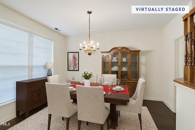3610 Long Ridge Rd, Durham, NC 27703 - dining area with dark wood-style flooring, a chandelier, and plenty of natural light