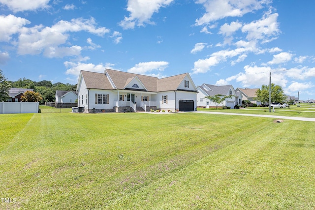 305 Maddux Dr, Pikeville, NC 27863 - view of front of home featuring crawl space, driveway, a garage, and a porch