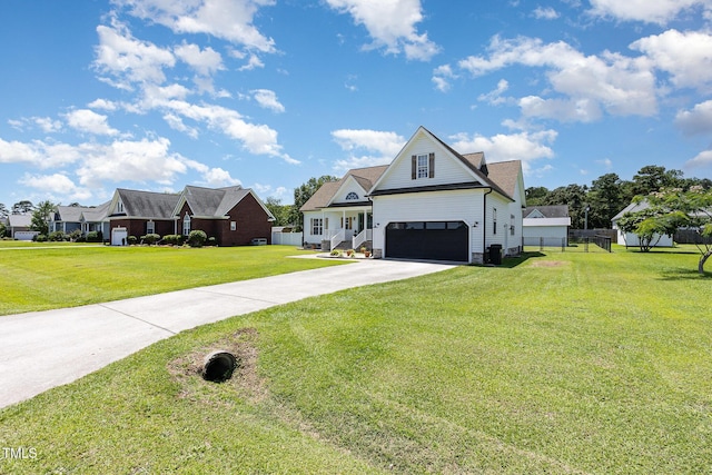 305 Maddux Dr, Pikeville, NC 27863 - view of front of property with driveway and a garage