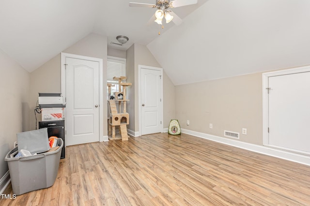 305 Maddux Dr, Pikeville, NC 27863 - additional living space with light wood-style floors, a ceiling fan, and vaulted ceiling