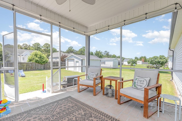 305 Maddux Dr, Pikeville, NC 27863 - sunroom with ceiling fan, a residential view, and healthy amount of natural light
