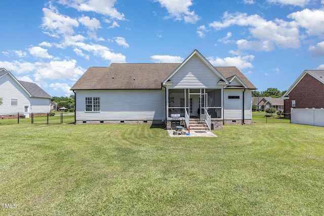 305 Maddux Dr, Pikeville, NC 27863 - back of house featuring crawl space, a sunroom, and a fenced backyard