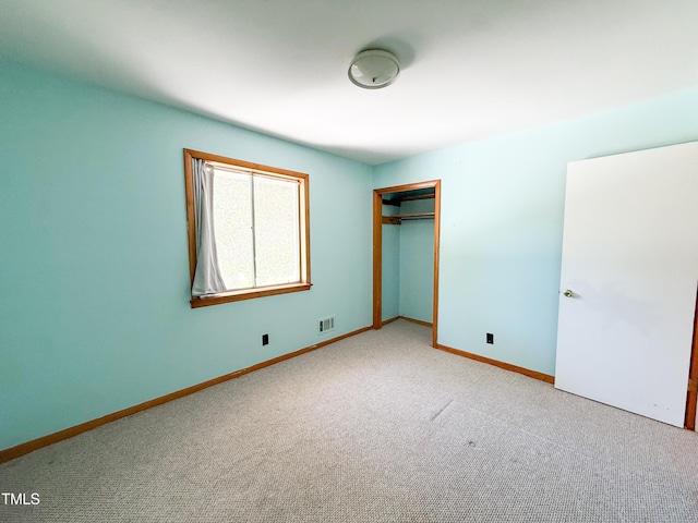 3323 Baugh St, Raleigh, NC 27604 - unfurnished bedroom with carpet floors and a closet