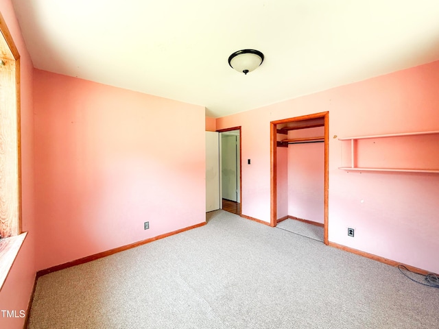 3323 Baugh St, Raleigh, NC 27604 - unfurnished bedroom with light colored carpet and a closet