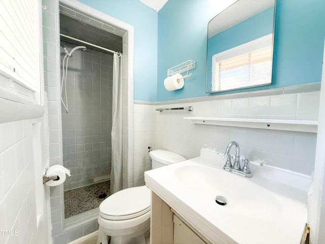 3323 Baugh St, Raleigh, NC 27604 - bathroom featuring a tile shower, vanity, a wainscoted wall, and tile walls