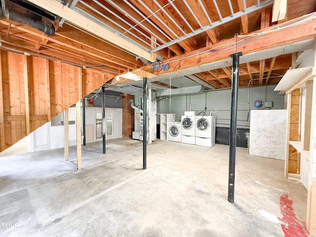 3323 Baugh St, Raleigh, NC 27604 - unfinished below grade area featuring washer and clothes dryer and heating unit