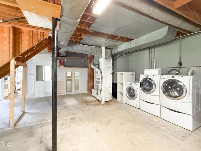 3323 Baugh St, Raleigh, NC 27604 - unfinished basement featuring washer and dryer and heating unit