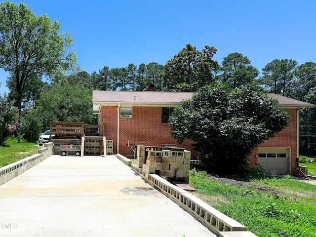3323 Baugh St, Raleigh, NC 27604 - view of front of property with driveway and brick siding