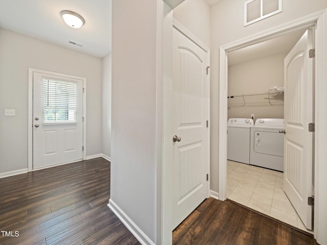 115 Snowy Orchid Ln, Smithfield, NC 27577 - washroom with independent washer and dryer and wood finished floors