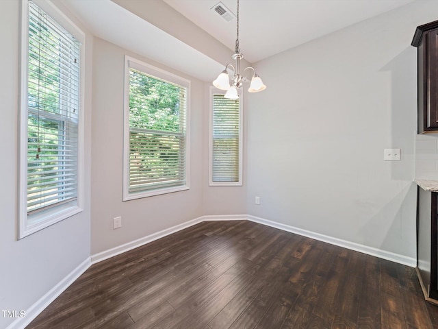 115 Snowy Orchid Ln, Smithfield, NC 27577 - unfurnished dining area with a chandelier and dark wood-type flooring