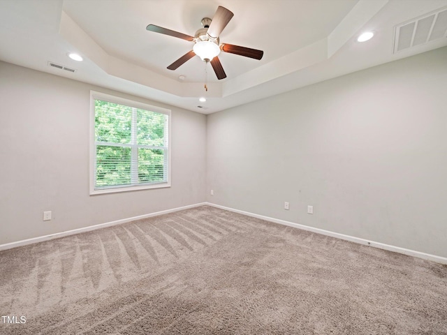 115 Snowy Orchid Ln, Smithfield, NC 27577 - empty room featuring recessed lighting, carpet flooring, a ceiling fan, and a raised ceiling