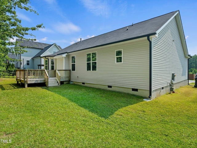 115 Snowy Orchid Ln, Smithfield, NC 27577 - back of property with crawl space, a yard, and a wooden deck