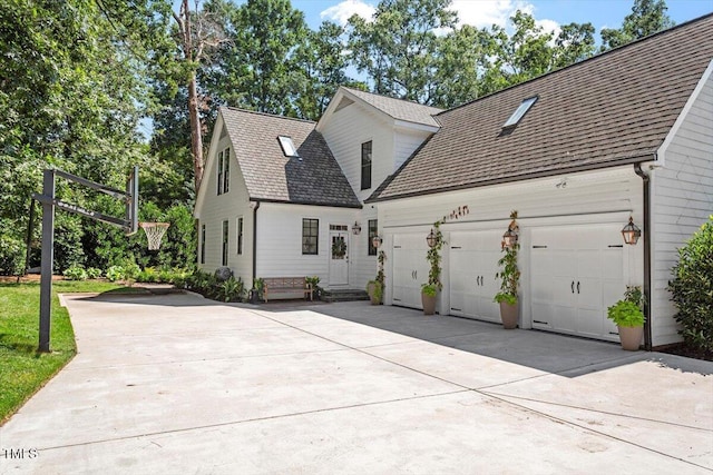 1054 Canterbury Ln, Chapel Hill, NC 27517 - view of front of property with driveway, a garage, and roof with shingles
