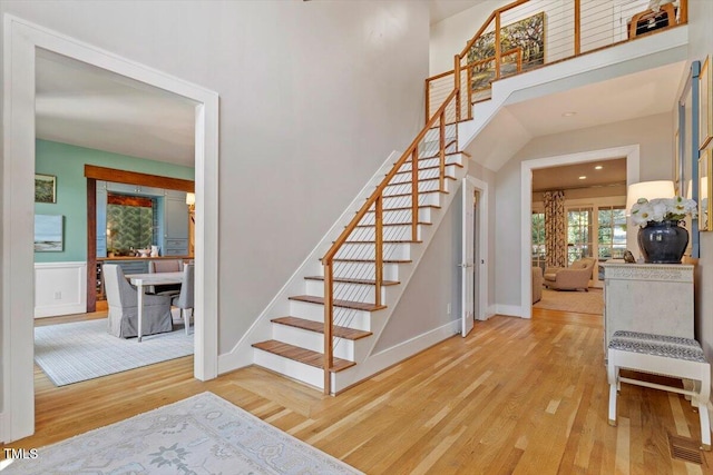 1054 Canterbury Ln, Chapel Hill, NC 27517 - stairway with wood finished floors and a high ceiling