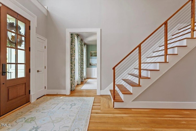 1054 Canterbury Ln, Chapel Hill, NC 27517 - foyer entrance with stairway and wood finished floors