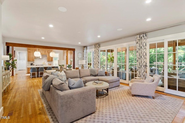 1054 Canterbury Ln, Chapel Hill, NC 27517 - living area with light wood finished floors, recessed lighting, and plenty of natural light