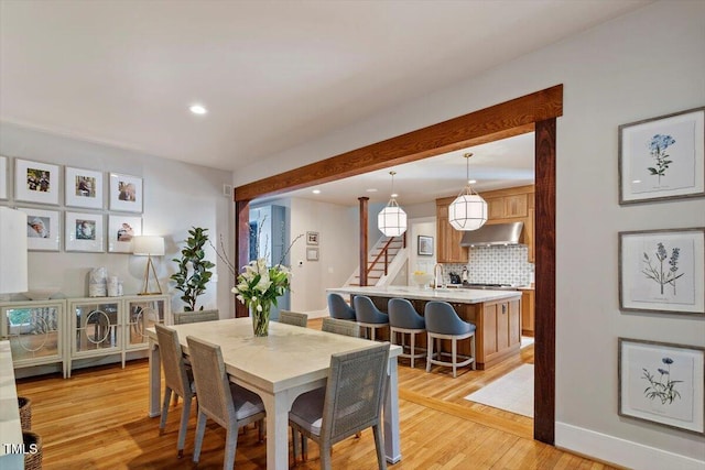 1054 Canterbury Ln, Chapel Hill, NC 27517 - dining space featuring recessed lighting, light wood-style flooring, and stairs