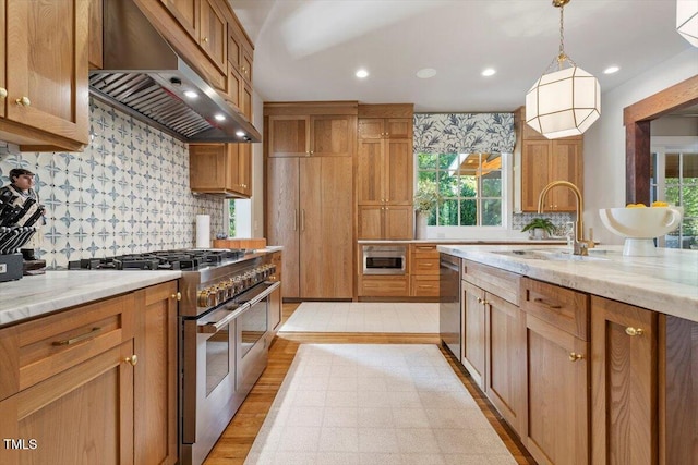 1054 Canterbury Ln, Chapel Hill, NC 27517 - kitchen featuring stainless steel appliances, range hood, backsplash, light stone countertops, and recessed lighting