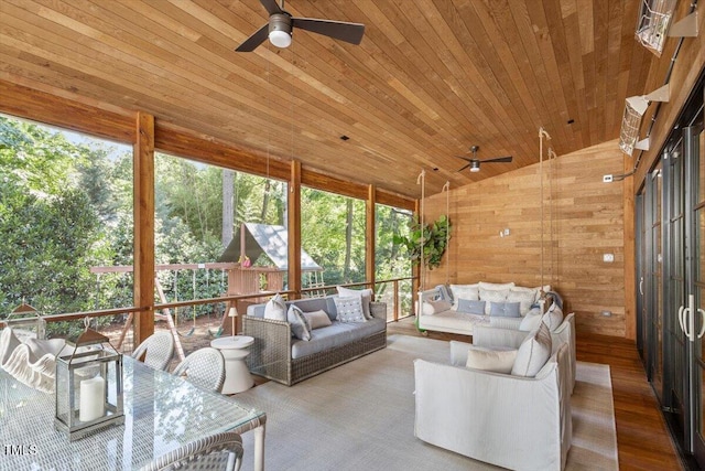 1054 Canterbury Ln, Chapel Hill, NC 27517 - living room with a ceiling fan, wood ceiling, healthy amount of natural light, vaulted ceiling, and wood walls