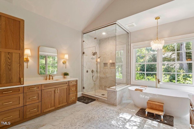 1054 Canterbury Ln, Chapel Hill, NC 27517 - bathroom featuring marble finish flooring, a shower stall, a soaking tub, vanity, and plenty of natural light