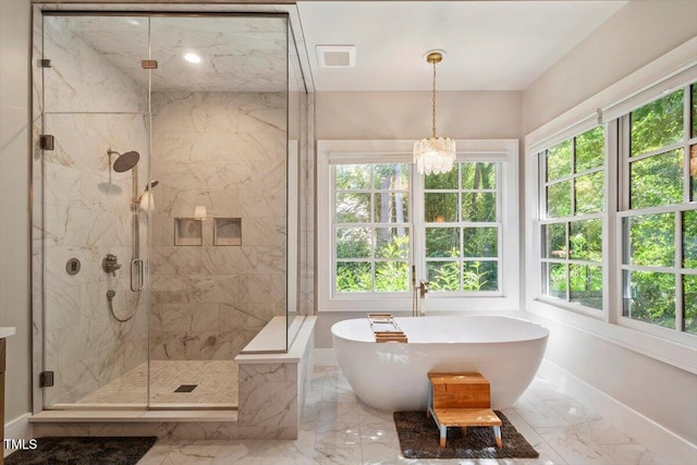 1054 Canterbury Ln, Chapel Hill, NC 27517 - bathroom with a freestanding bath, marble finish flooring, a marble finish shower, and healthy amount of natural light