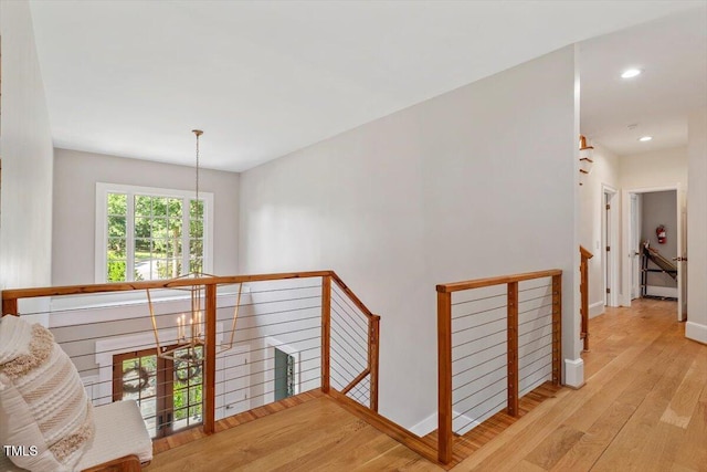 1054 Canterbury Ln, Chapel Hill, NC 27517 - hallway with an upstairs landing, light wood-style floors, and recessed lighting