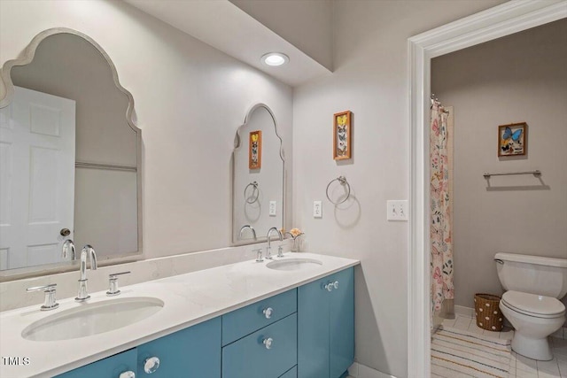 1054 Canterbury Ln, Chapel Hill, NC 27517 - full bath with double vanity, tile patterned flooring, and curtained shower