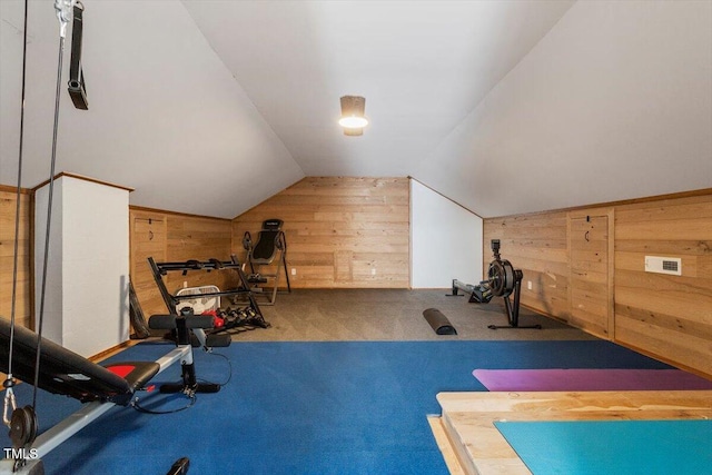 1054 Canterbury Ln, Chapel Hill, NC 27517 - exercise area with wooden walls, lofted ceiling, and carpet