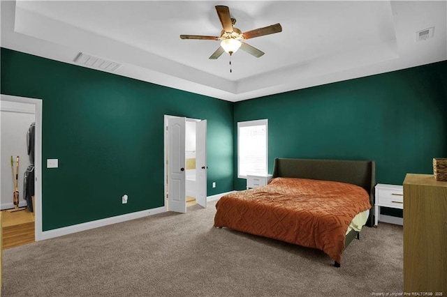 116 School Side Dr, Spring Lake, NC 28390 - bedroom with a raised ceiling, carpet floors, and a ceiling fan