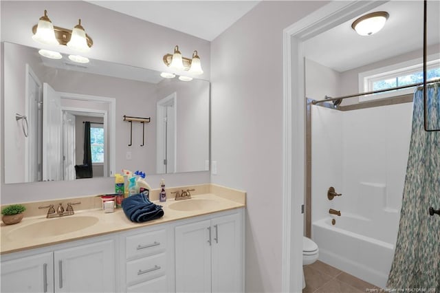 116 School Side Dr, Spring Lake, NC 28390 - full bathroom with double vanity, shower / tub combo, and tile patterned floors